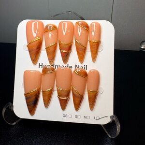 Peach Marble Stiletto Press-On Nails with Gold Accent